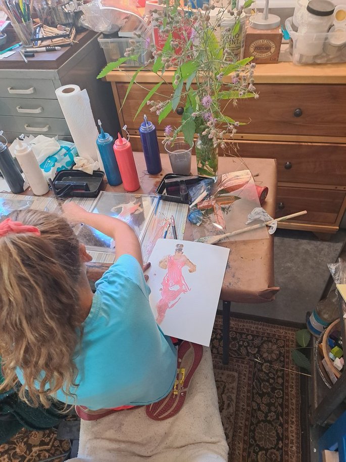 students in Tilley Bubb's studio working on gel plate prints'